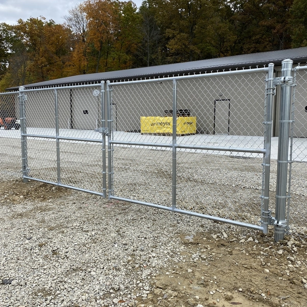 Commercial chain-link fence and vehicle gate